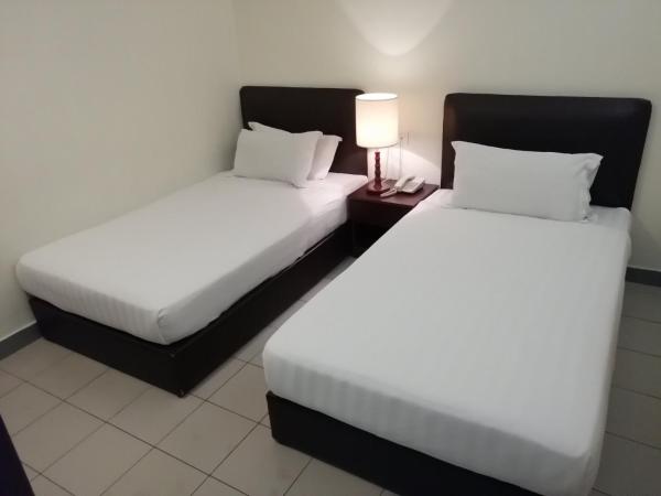 DM Hotel : photo 1 de la chambre chambre lits jumeaux