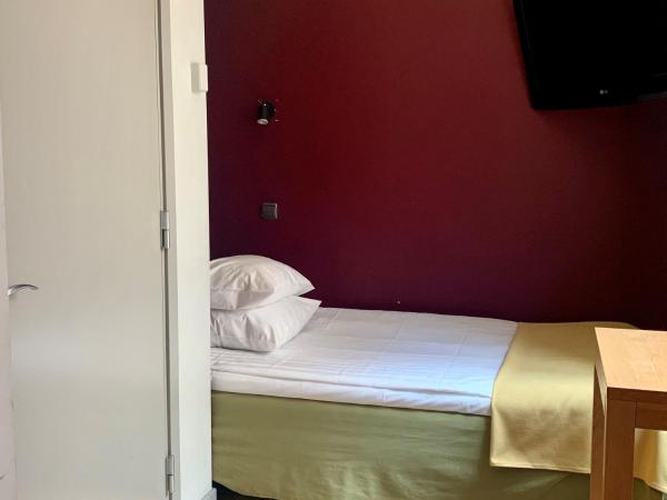 Rex Petit : photo 1 de la chambre chambre simple Économique sans fenêtre