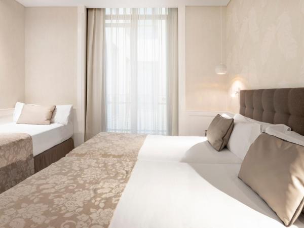 Catalonia Puerta del Sol : photo 2 de la chambre chambre triple