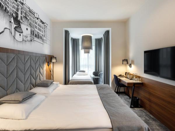 Garden Square Hotel : photo 1 de la chambre chambre quadruple