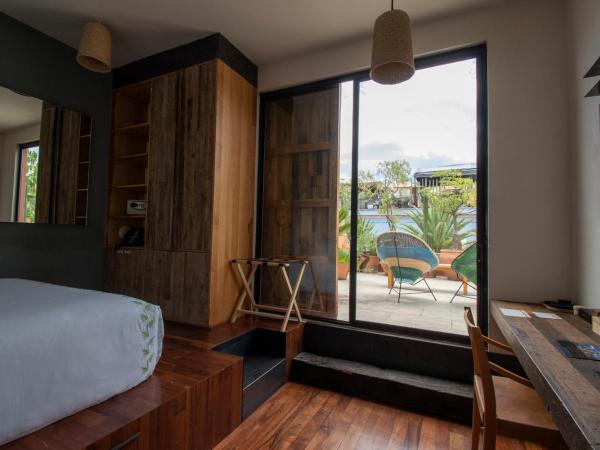 Hotel Los Amantes : photo 4 de la chambre chambre lit queen-size avec balcon