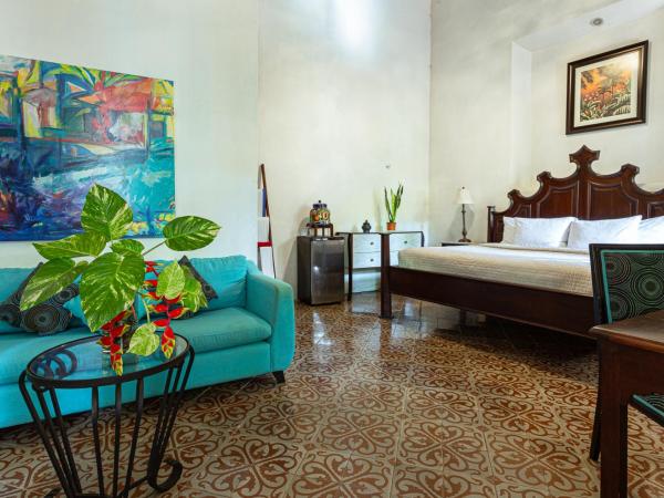 VILLA MERIDA BOUTIQUE HOTEL - Adults Only : photo 1 de la chambre chambre double - vue sur jardin