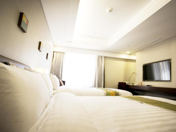 Seoul Garden Hotel : photo 1 de la chambre chambre lits jumeaux familiale