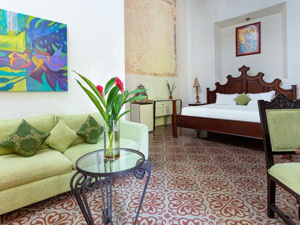 VILLA MERIDA BOUTIQUE HOTEL - Adults Only : photo 1 de la chambre chambre lit queen-size - vue sur jardin