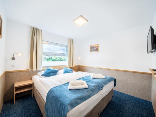 Botel Racek : photo 4 de la chambre chambre double ou lits jumeaux deluxe - vue sur rivière