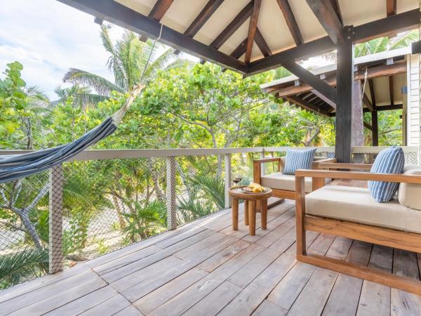 Villa Pescadores Tulum : photo 9 de la chambre chambre deluxe avec 2 lits doubles