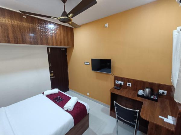 New Metro Serviced Apartment : photo 9 de la chambre chambre double standard