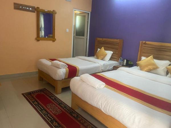 Thanapati Guesthouse : photo 7 de la chambre chambre triple deluxe