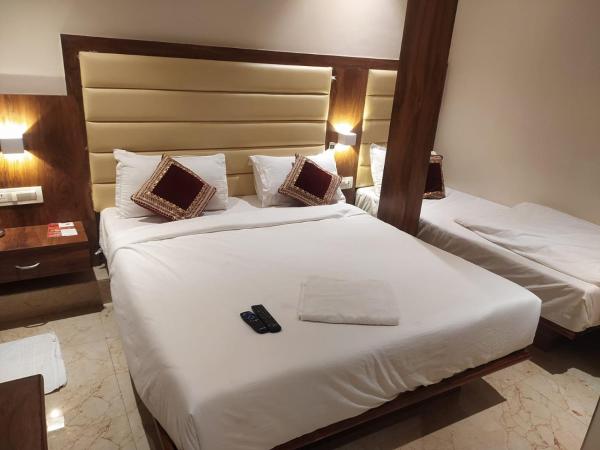 Hotel Adams Inn Near Mumbai Airport : photo 3 de la chambre chambre triple classique