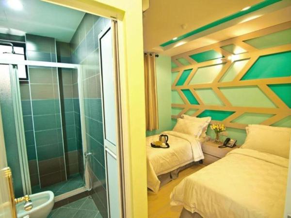 Sunshine Inn : photo 2 de la chambre chambre lits jumeaux deluxe