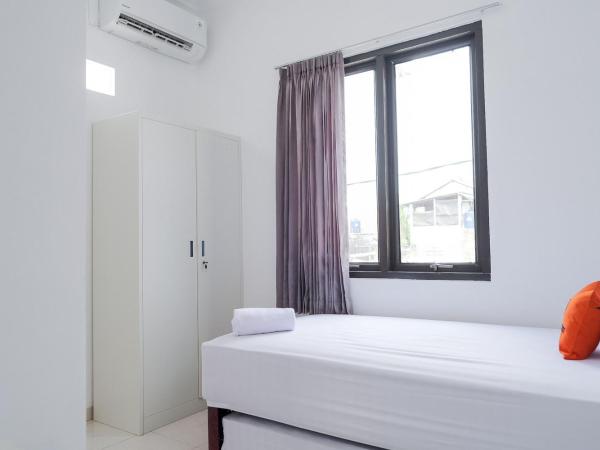 KoolKost near Jalan Veteran Raya (Minimum Stay 6 Nights) : photo 4 de la chambre chambre lits jumeaux