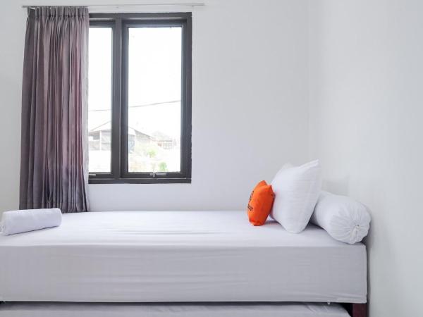 KoolKost near Jalan Veteran Raya (Minimum Stay 6 Nights) : photo 5 de la chambre chambre lits jumeaux