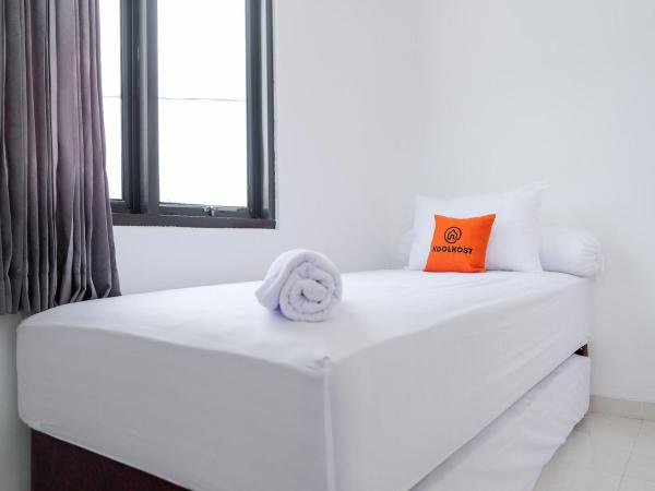 KoolKost near Jalan Veteran Raya (Minimum Stay 6 Nights) : photo 8 de la chambre chambre lits jumeaux