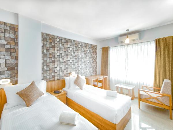 Sidra Pristine Hotel and Portico Halls : photo 5 de la chambre chambre lits jumeaux standard