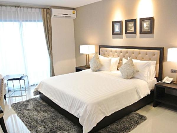 SN Plus Hotel - SHA Plus : photo 1 de la chambre chambre lit king-size avec balcon