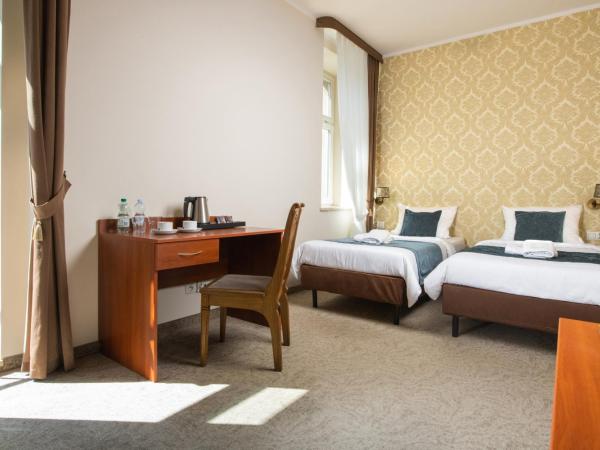 Aparthotel Globus Kraków : photo 4 de la chambre chambre double ou lits jumeaux