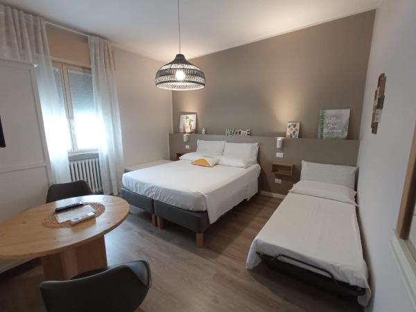 L'Ulivo : photo 4 de la chambre chambre double ou lits jumeaux avec lit d'appoint