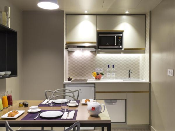 Citadines Opéra Paris : photo 2 de la chambre appartement