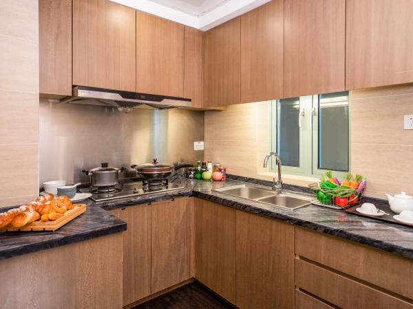 Fietser International Residence : photo 4 de la chambre warm yijia two-bedroom apartment