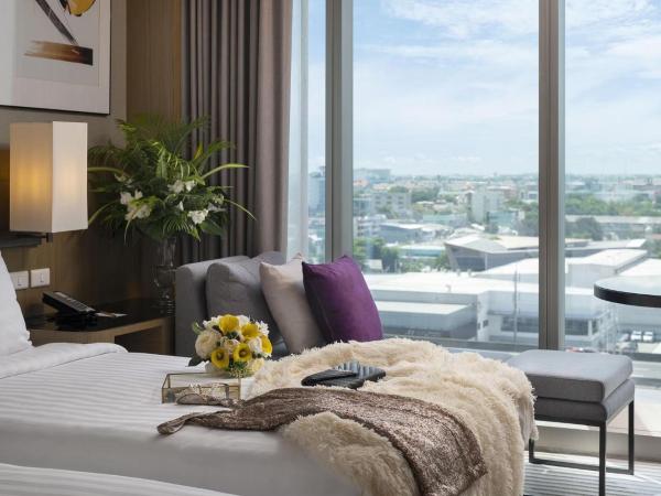 Asawin Grand Convention Hotel : photo 1 de la chambre chambre lits jumeaux