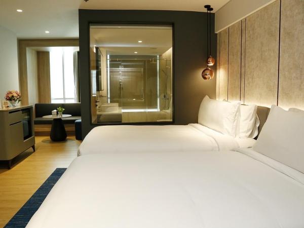 Miracle Grand Convention Hotel : photo 4 de la chambre chambre lits jumeaux deluxe