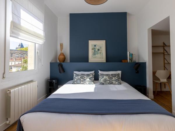 Les Séraphines - Chambres d'hôtes - Guests house : photo 1 de la chambre chambre deluxe double ou lits jumeaux