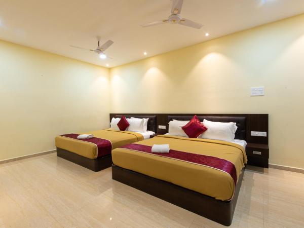 Sugam Resort & Convention Centre : photo 1 de la chambre suite familiale