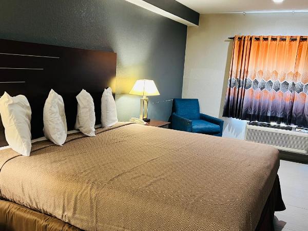 REGENCY INN & SUITS : photo 1 de la chambre chambre lit king-size