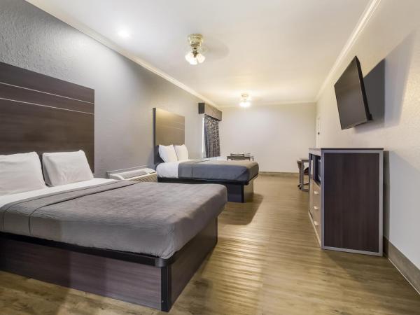 Americas Best Value Platinum Inn & Suites : photo 2 de la chambre hébergement avec 2 lits queen-size