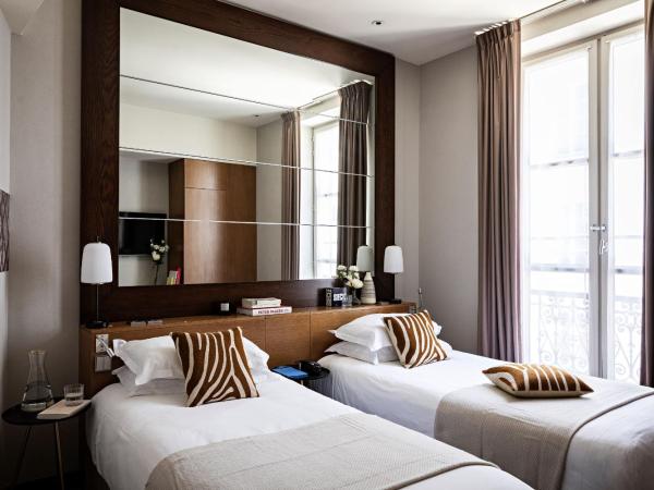 Holiday Inn Paris Elysées, an IHG Hotel : photo 1 de la chambre chambre lits jumeaux standard