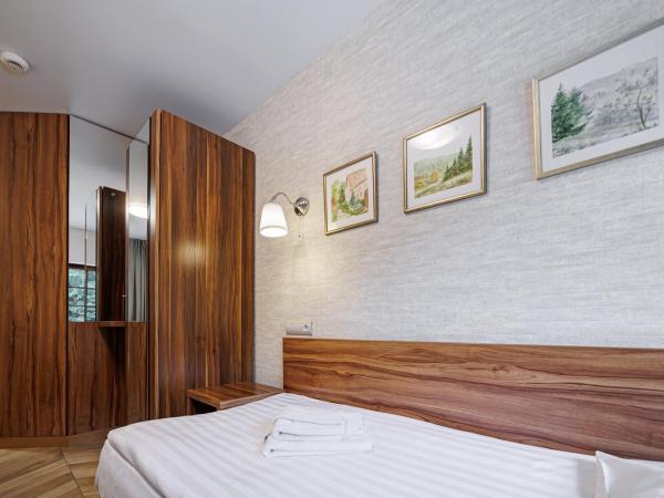 Leśne Patio : photo 4 de la chambre grande chambre double avec salle de bains