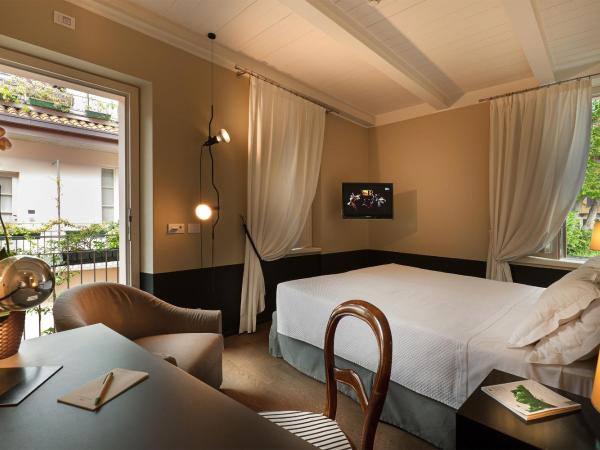 Maison Borella : photo 2 de la chambre chambre double ou lits jumeaux - vue sur cour