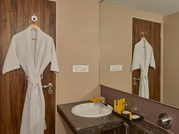 Hotel Bawa Regency : photo 7 de la chambre chambre double deluxe