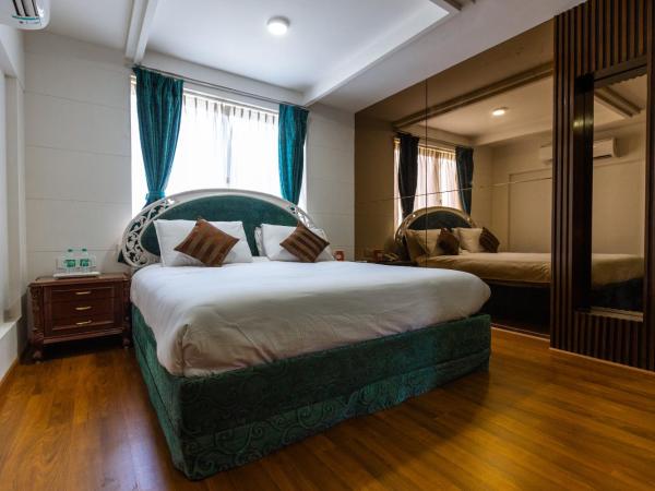 3 BY OYO Nami Residency Ahmedabad : photo 6 de la chambre chambre triple confort avec douche
