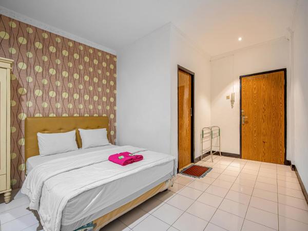 Hotel Cempaka Sari : photo 3 de la chambre chambre quadruple deluxe