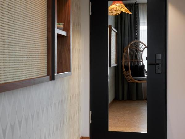 Cocoon Salzburg : photo 6 de la chambre chambre lits jumeaux pour personnes à mobilité réduite