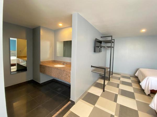 Hotel Estrella de Oriente : photo 10 de la chambre chambre double standard avec 2 lits doubles