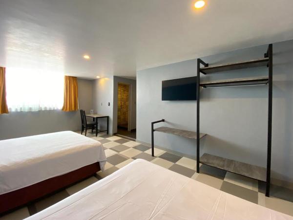 Hotel Estrella de Oriente : photo 7 de la chambre chambre double standard avec 2 lits doubles