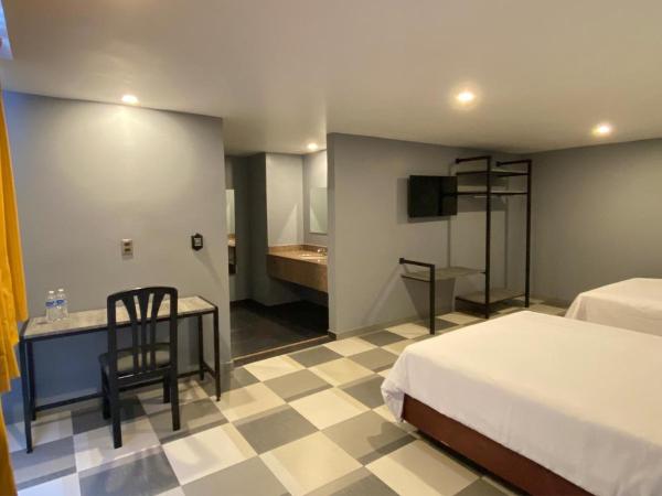 Hotel Estrella de Oriente : photo 2 de la chambre chambre double standard avec 2 lits doubles