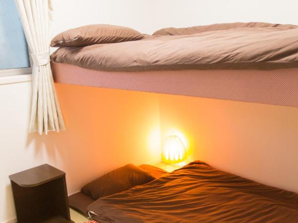 Fujitaya Kyoto : photo 2 de la chambre chambre lits jumeaux avec salle de bains commune