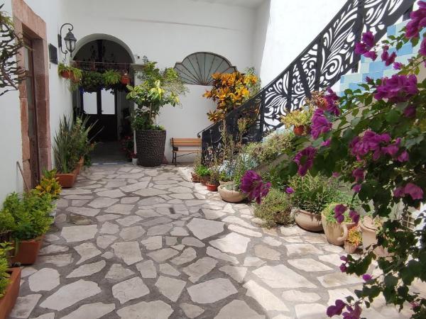 El Jardín de la Abuela : photo 1 de la chambre chambre lit king-size avec baignoire spa