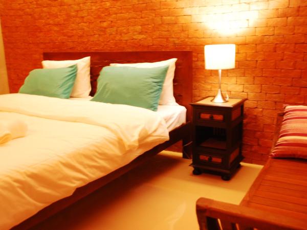 The White Elephant Home : photo 7 de la chambre chambre lit king-size avec balcon