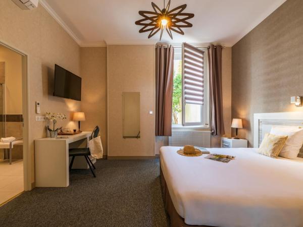 CERISE Royan - Le Grand Hôtel de la Plage : photo 4 de la chambre chambre double ou lits jumeaux - vue sur ville