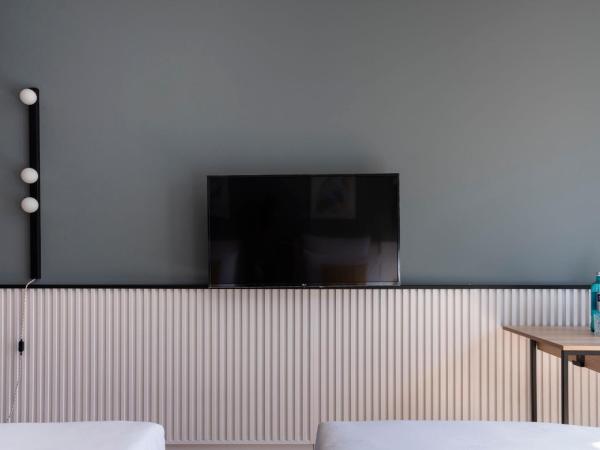 numa I Arc Rooms & Apartments : photo 10 de la chambre medium room - twin beds