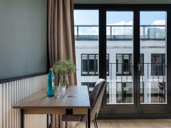 numa I Arc Rooms & Apartments : photo 2 de la chambre medium room - twin beds