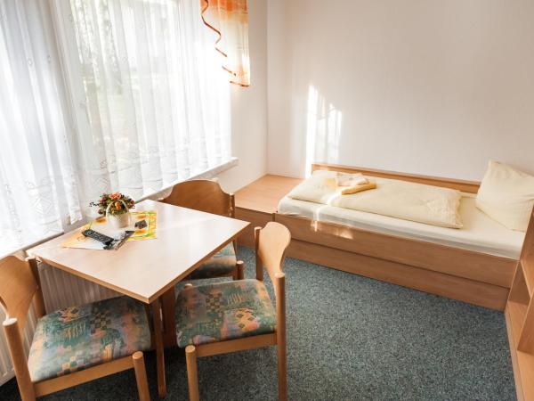 Sportpension Dresden : photo 1 de la chambre chambre triple