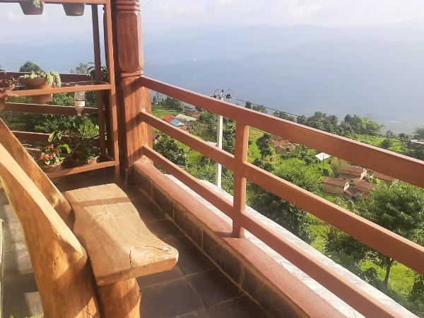 Dulcify cottage sarangkot : photo 4 de la chambre chambre lit queen-size avec balcon