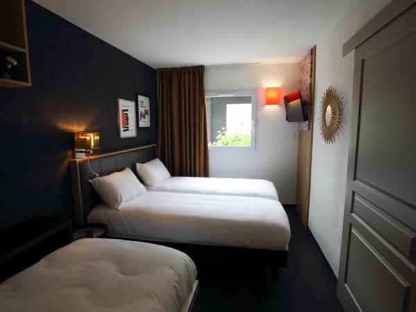 greet La Teste Bassin d'Arcachon : photo 1 de la chambre chambre pop avec lits jumeaux et 1 lit simple