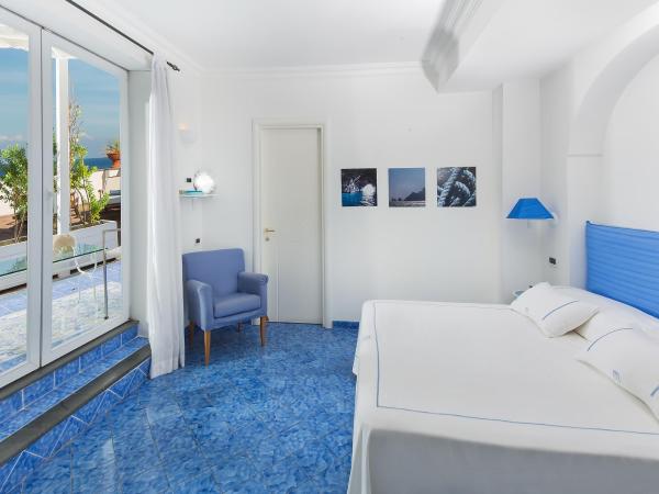 Relais Maresca Luxury Small Hotel & Terrace Restaurant : photo 4 de la chambre chambre penthouse avec terrasse privée