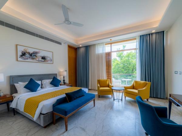 ELLAA RESIDENCES : photo 5 de la chambre chambre lit king-size avec balcon